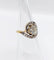 Bague 48 Bague tourbillon ancienne en or 18k et platine, diamants 58 Facettes A06630