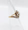 Bague 48 Bague tourbillon ancienne en or 18k et platine, diamants 58 Facettes A06630