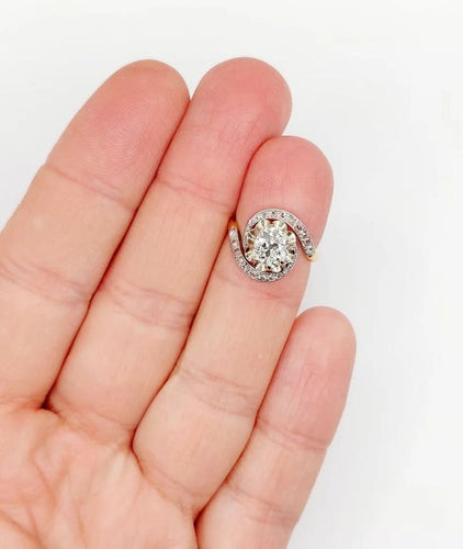 Bague 48 Bague tourbillon ancienne en or 18k et platine, diamants 58 Facettes A06630