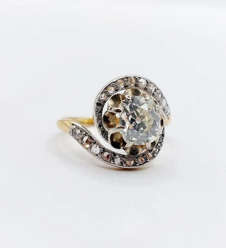 Bague 48 Bague tourbillon ancienne en or 18k et platine, diamants 58 Facettes A06630