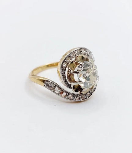 Bague 48 Bague tourbillon ancienne en or 18k et platine, diamants 58 Facettes A06630