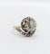 Bague 48 Bague tourbillon ancienne en or 18k et platine, diamants 58 Facettes A06630