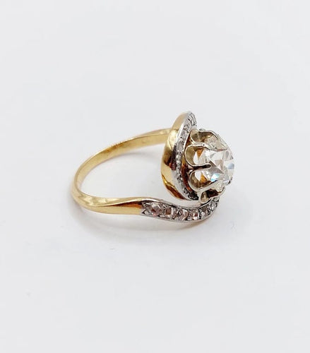 Bague 48 Bague tourbillon ancienne en or 18k et platine, diamants 58 Facettes A06630