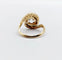 Bague 48 Bague tourbillon ancienne en or 18k et platine, diamants 58 Facettes A06630