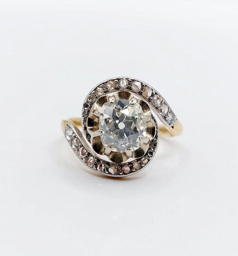 Bague 48 Bague tourbillon ancienne en or 18k et platine, diamants 58 Facettes A06630