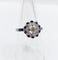 Bague 54.5 Bague fleur Art déco en or blanc 18k, diamants taille ancienne et saphirs 58 Facettes A06654