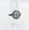 Bague 54.5 Bague fleur Art déco en or blanc 18k, diamants taille ancienne et saphirs 58 Facettes A06654