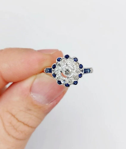 Bague 54.5 Bague fleur Art déco en or blanc 18k, diamants taille ancienne et saphirs 58 Facettes A06654