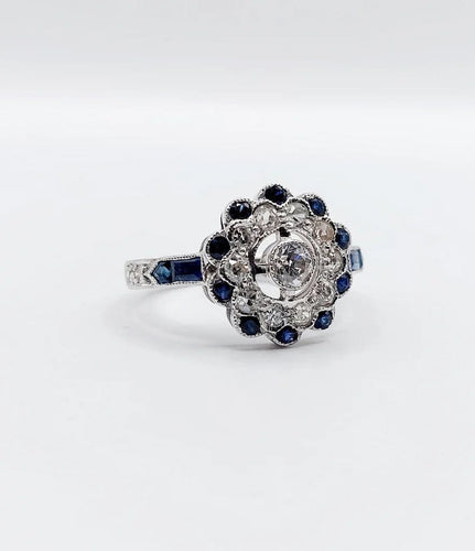 Bague 54.5 Bague fleur Art déco en or blanc 18k, diamants taille ancienne et saphirs 58 Facettes A06654