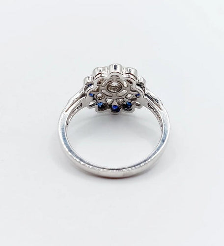 Bague 54.5 Bague fleur Art déco en or blanc 18k, diamants taille ancienne et saphirs 58 Facettes A06654
