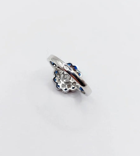 Bague 54.5 Bague fleur Art déco en or blanc 18k, diamants taille ancienne et saphirs 58 Facettes A06654