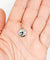 Pendentif Pendentif cible Art déco en or blanc 18k et platine, saphir synthétique et diamants 58 Facettes A06550