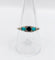 Bague 58 Bague jarretière Art déco en or blanc 18k, saphir et turquoises 58 Facettes A04043