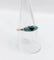 Bague 58 Bague jarretière Art déco en or blanc 18k, saphir et turquoises 58 Facettes A04043