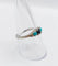 Bague 58 Bague jarretière Art déco en or blanc 18k, saphir et turquoises 58 Facettes A04043