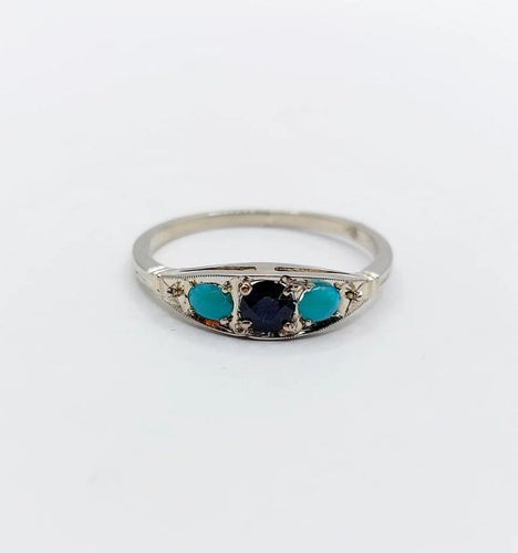 Bague 58 Bague jarretière Art déco en or blanc 18k, saphir et turquoises 58 Facettes A04043