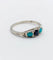 Bague 58 Bague jarretière Art déco en or blanc 18k, saphir et turquoises 58 Facettes A04043