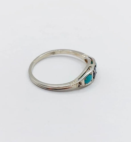 Bague 58 Bague jarretière Art déco en or blanc 18k, saphir et turquoises 58 Facettes A04043