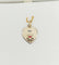 Pendentif A. Augis - Pendentif médaille d’amour L’Intemporelle en or 18k rubis synthétique 58 Facettes J5013X0000