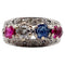 Bague 51 Bague jarretière Art déco en or blanc 18k, diamants, saphir et rubis 58 Facettes A03240