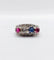 Bague 51 Bague jarretière Art déco en or blanc 18k, diamants, saphir et rubis 58 Facettes A03240