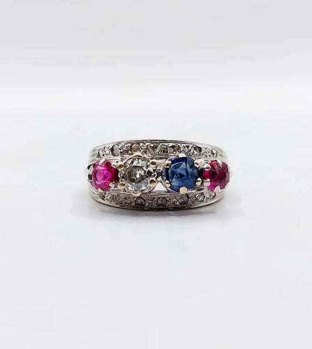Bague 51 Bague jarretière Art déco en or blanc 18k, diamants, saphir et rubis 58 Facettes A03240