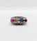 Bague 51 Bague jarretière Art déco en or blanc 18k, diamants, saphir et rubis 58 Facettes A03240