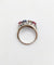 Bague 51 Bague jarretière Art déco en or blanc 18k, diamants, saphir et rubis 58 Facettes A03240