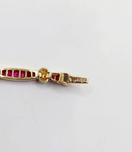 Bracelet Bracelet Art déco en or jaune 18K avec rubis synthétiques et diamants 58 Facettes A05502