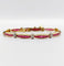 Bracelet Bracelet Art déco en or jaune 18K avec rubis synthétiques et diamants 58 Facettes A05502