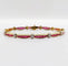 Bracelet Bracelet Art déco en or jaune 18K avec rubis synthétiques et diamants 58 Facettes A05502