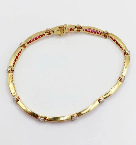 Bracelet Bracelet Art déco en or jaune 18K avec rubis synthétiques et diamants 58 Facettes A05502