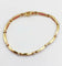 Bracelet Bracelet Art déco en or jaune 18K avec rubis synthétiques et diamants 58 Facettes A05502