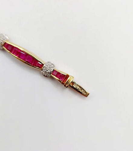 Bracelet Bracelet Art déco en or jaune 18K avec rubis synthétiques et diamants 58 Facettes A05502