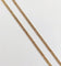 Collier Chaîne sautoir antique en or jaune 14K à mailles gourmette 58 Facettes A05536