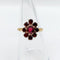 Bague 54.5 Bague marguerite vintage en or rose 18k et grenats 58 Facettes A05833