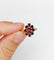 Bague 54.5 Bague marguerite vintage en or rose 18k et grenats 58 Facettes A05833