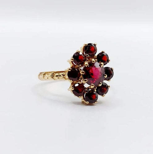 Bague 54.5 Bague marguerite vintage en or rose 18k et grenats 58 Facettes A05833
