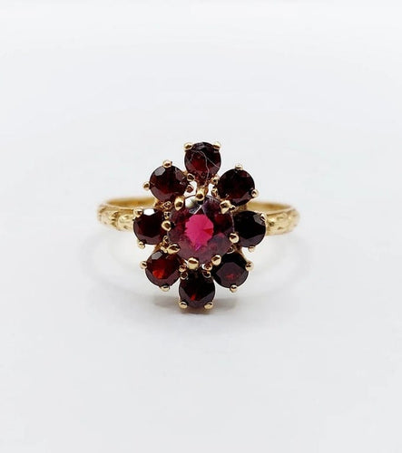Bague 54.5 Bague marguerite vintage en or rose 18k et grenats 58 Facettes A05833