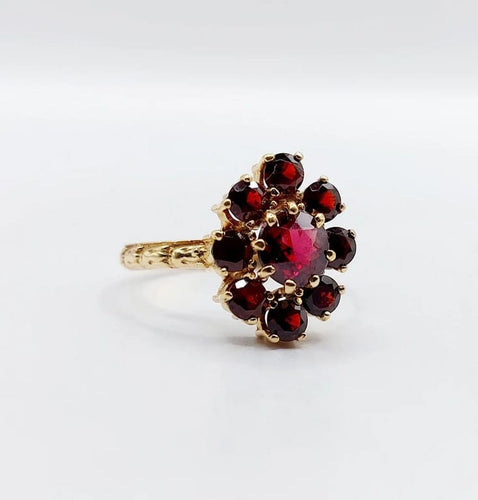Bague 54.5 Bague marguerite vintage en or rose 18k et grenats 58 Facettes A05833