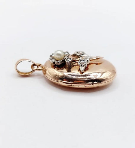 Pendentif Pendentif porte-photo en or rose 18k et argent, perles (circa 1900) 58 Facettes A05863