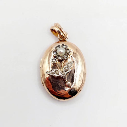 Pendentif Pendentif porte-photo en or rose 18k et argent, perles (circa 1900) 58 Facettes A05863