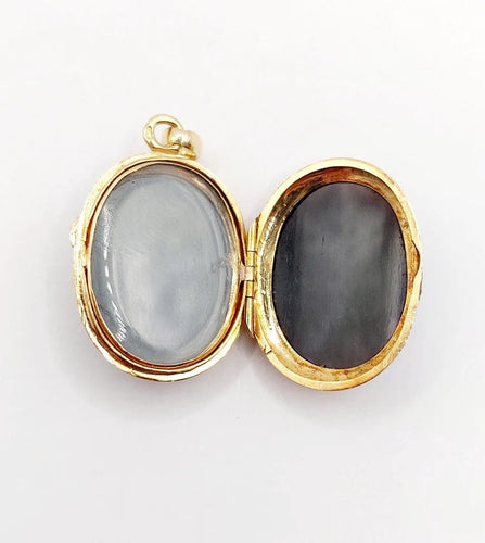 Pendentif Pendentif porte-photo antique en or jaune 18k et agate (circa 1900) 58 Facettes A06013