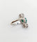 Bague 50 Bague marquise Art déco en or blanc 18k, émeraude et diamants 58 Facettes A06115