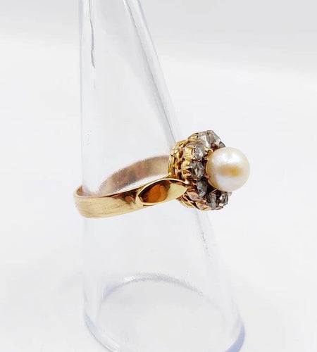 Bague 56 Bague marguerite antique en or rose 18k, perle et diamants 58 Facettes A06199