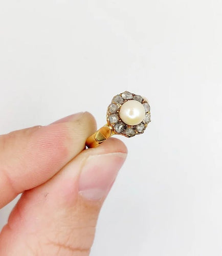 Bague 56 Bague marguerite antique en or rose 18k, perle et diamants 58 Facettes A06199