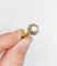 Bague 56 Bague marguerite antique en or rose 18k, perle et diamants 58 Facettes A06199