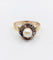 Bague 56 Bague marguerite antique en or rose 18k, perle et diamants 58 Facettes A06199
