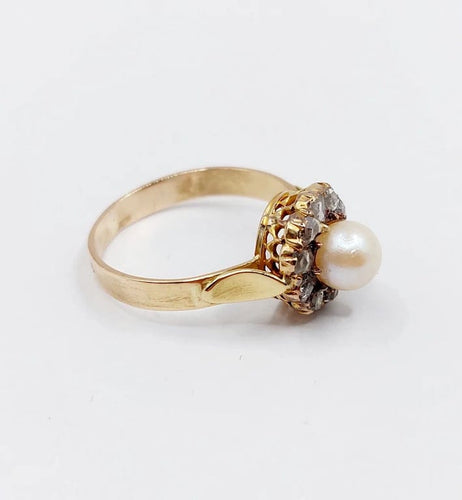 Bague 56 Bague marguerite antique en or rose 18k, perle et diamants 58 Facettes A06199