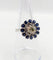 Bague 51.5 Art déco - Bague marguerite en or blanc 18k, diamant 0,65 ct et saphirs 58 Facettes A06329